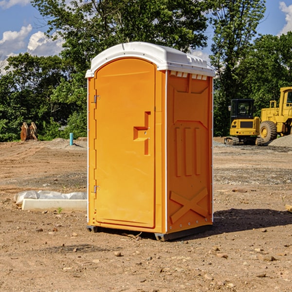 what is the cost difference between standard and deluxe portable toilet rentals in Calverton